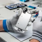 La imagen 4 de la Empresa MUNDO DE TÉCNOLOGIA - REPARACIÓN DE MOVILES Tienda de Ropa en Madrid M