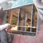 La imagen 8 de la Empresa TALLERES NEPTUNO S.L Transportes y Turismo en Barcelona B