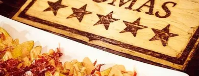 La imagen 14 de la Empresa ENRIQUE TOMÁS JAMON-TAPAS-VINO Tiendas y Productores de Alimentos en Badalona B