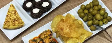 La imagen 21 de la Empresa ENRIQUE TOMÁS JAMON-TAPAS-VINO Tiendas y Productores de Alimentos en Badalona B