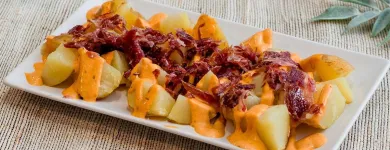 La imagen 36 de la Empresa ENRIQUE TOMÁS JAMON-TAPAS-VINO Tiendas y Productores de Alimentos en Badalona B