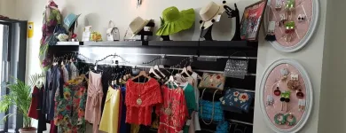 La imagen 25 de la Empresa MODAS Y COMPLEMENTOS LA BIZNAGA Tienda de Ropa en Churriana MA