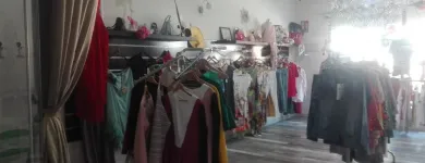 La imagen 28 de la Empresa MODAS Y COMPLEMENTOS LA BIZNAGA Tienda de Ropa en Churriana MA