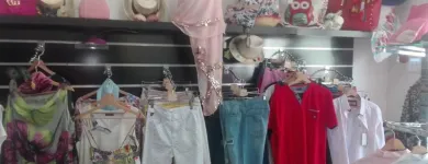 La imagen 33 de la Empresa MODAS Y COMPLEMENTOS LA BIZNAGA Tienda de Ropa en Churriana MA